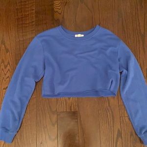Blue cropped crew neck in size women’s small
